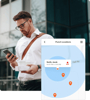 Business owner using a phone with GPS punch location tracking displayed, showcasing mobile time tracking features